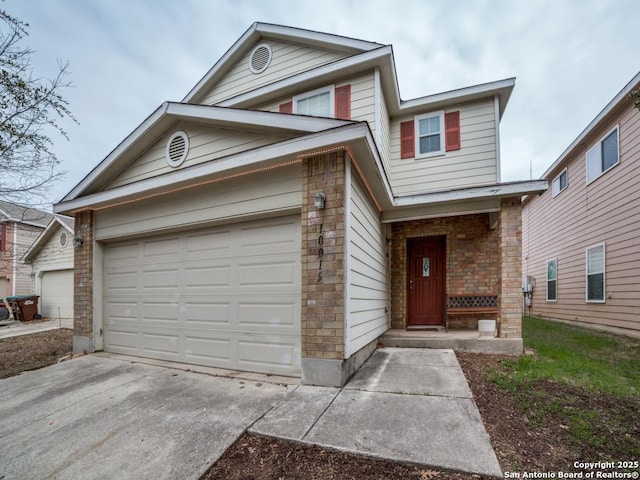 view of front of house featuring brick siding, driveway, and an attached garage