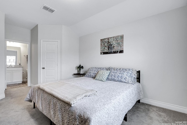 bedroom featuring light carpet, baseboards, and visible vents