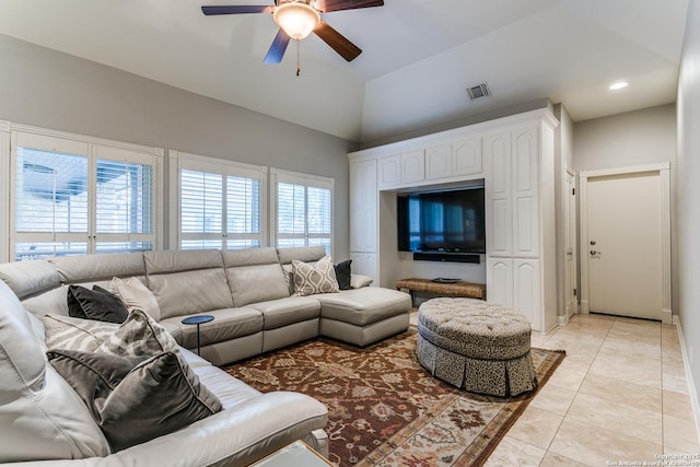 living area with light tile patterned floors, recessed lighting, visible vents, a ceiling fan, and vaulted ceiling