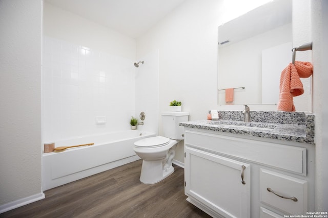 full bathroom featuring shower / bath combination, toilet, wood finished floors, and vanity