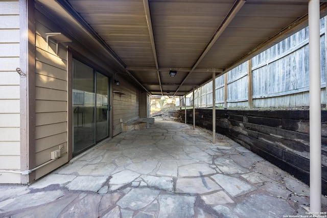 view of patio / terrace with a carport