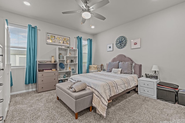 bedroom with baseboards, ceiling fan, recessed lighting, and light colored carpet