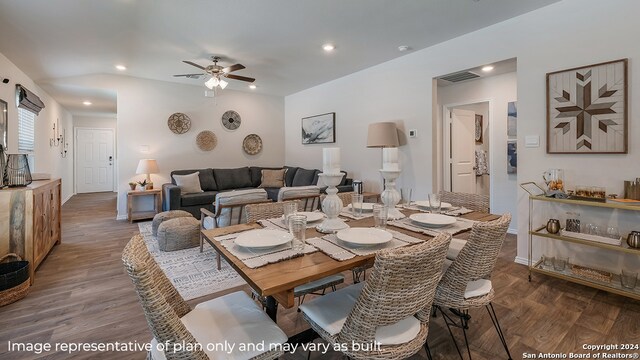 dining area with visible vents, dark wood-style flooring, and recessed lighting