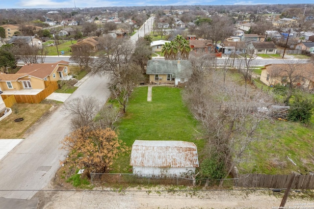 birds eye view of property with a residential view