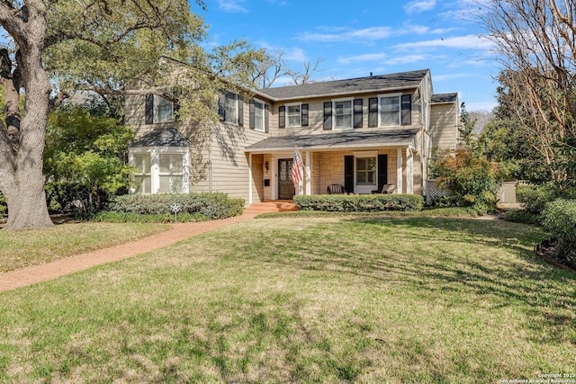 331 Ridgemont, Terrell Hills, TX 78209 - traditional-style house featuring covered porch and a front yard