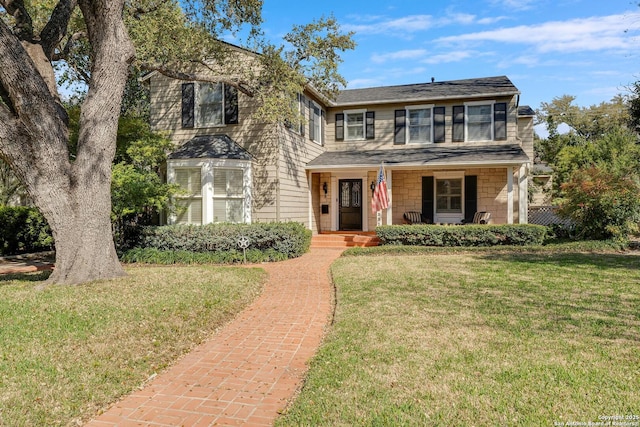 331 Ridgemont, Terrell Hills, TX 78209 - view of front facade with a front lawn and covered porch