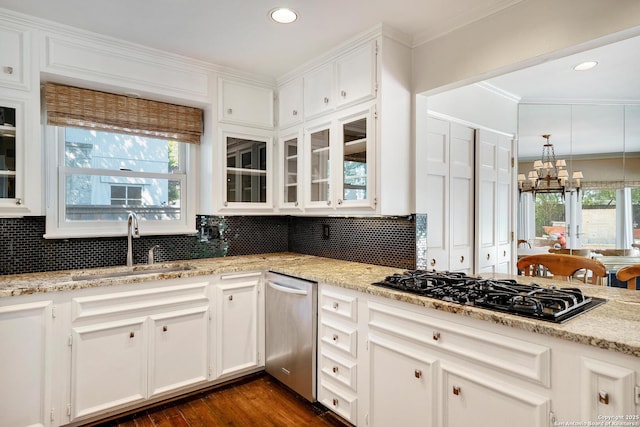 331 Ridgemont, Terrell Hills, TX 78209 - kitchen featuring black gas cooktop, white cabinets, decorative backsplash, crown molding, and recessed lighting