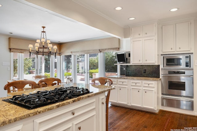 331 Ridgemont, Terrell Hills, TX 78209 - kitchen featuring stainless steel appliances, a warming drawer, plenty of natural light, a chandelier, and recessed lighting
