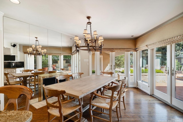 331 Ridgemont, Terrell Hills, TX 78209 - dining space featuring a chandelier, healthy amount of natural light, ornamental molding, and wood finished floors