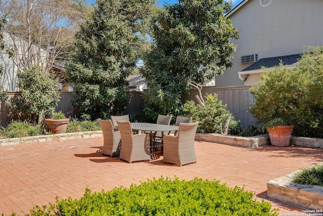 331 Ridgemont, Terrell Hills, TX 78209 - fenced backyard featuring outdoor dining space and a patio