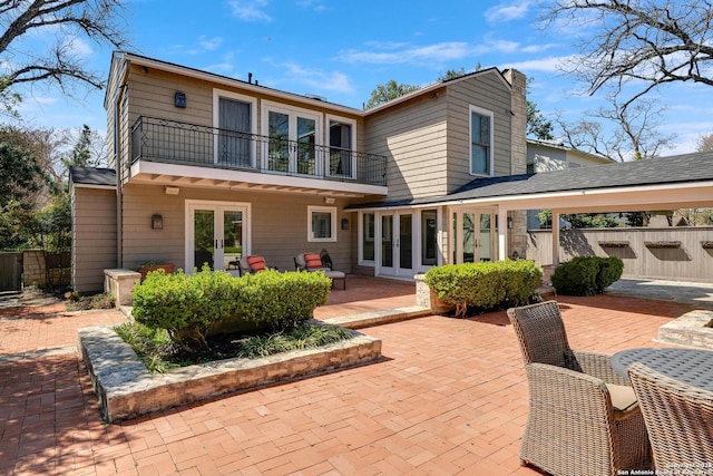 331 Ridgemont, Terrell Hills, TX 78209 - back of property featuring french doors, a balcony, and a patio