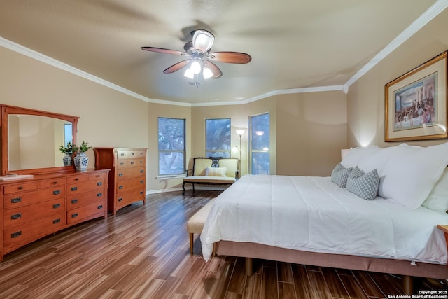 bedroom featuring wood finished floors, a ceiling fan, and crown molding