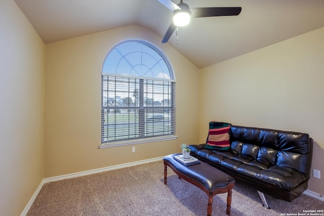 living area with lofted ceiling, carpet floors, ceiling fan, and baseboards