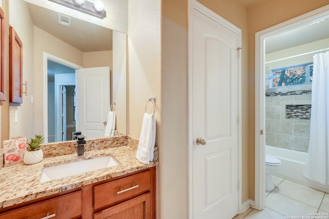 bathroom featuring shower / bath combo, visible vents, toilet, tile patterned floors, and vanity