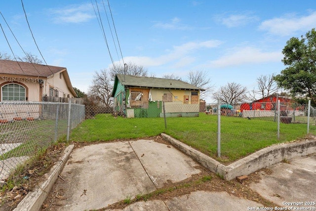 view of front of home with a patio area, a front yard, fence, and stucco siding