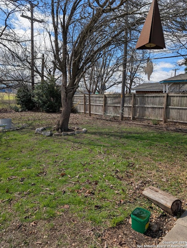 view of yard with fence