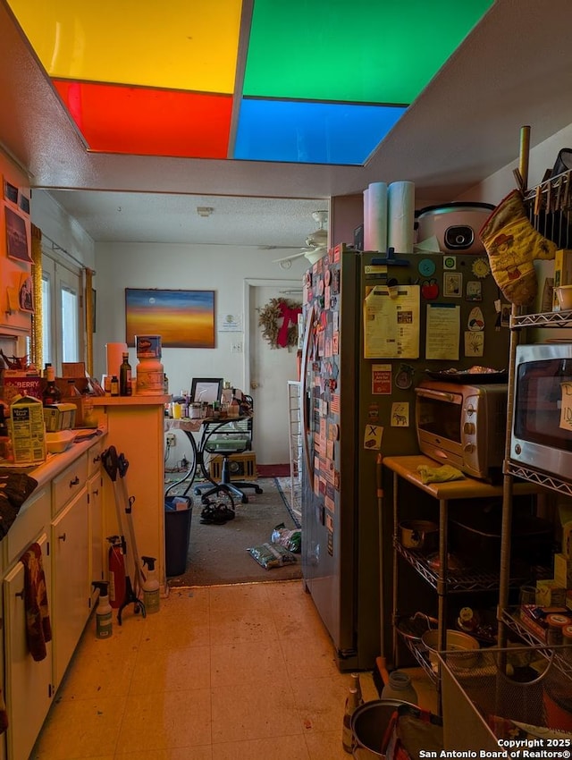 interior space featuring stainless steel appliances and a toaster