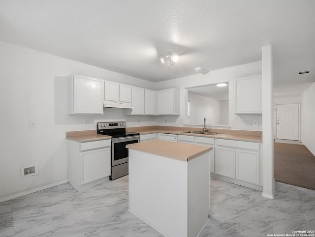 kitchen featuring white cabinets, marble finish floor, stainless steel electric range, light countertops, and a sink