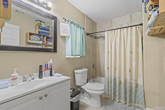 full bathroom featuring a textured wall, toilet, shower / bath combo with shower curtain, vanity, and a textured ceiling