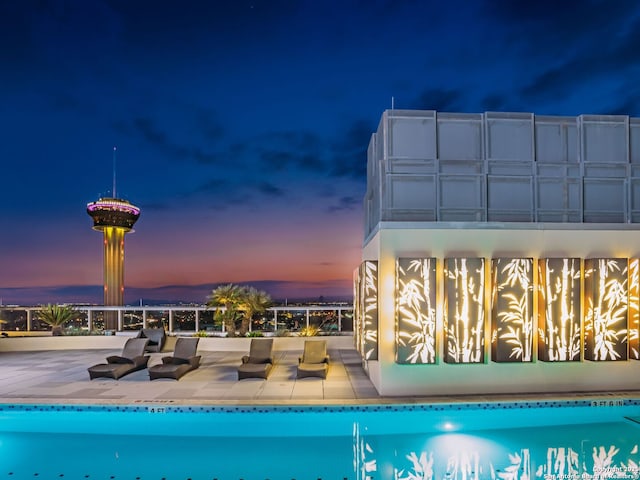 view of swimming pool with a patio area