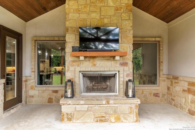 exterior space featuring an outdoor stone fireplace