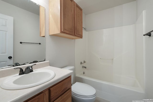 full bath featuring tub / shower combination, vanity, and toilet