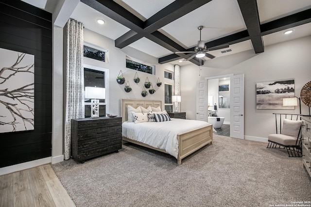 bedroom with baseboards, visible vents, coffered ceiling, wood finished floors, and beam ceiling