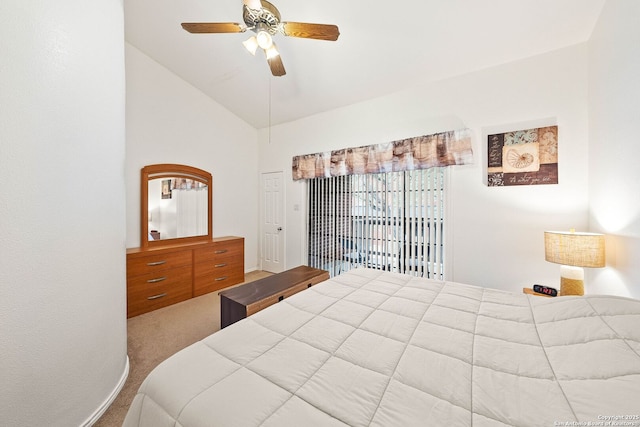 bedroom featuring lofted ceiling, ceiling fan, and carpet