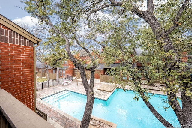 community pool with fence