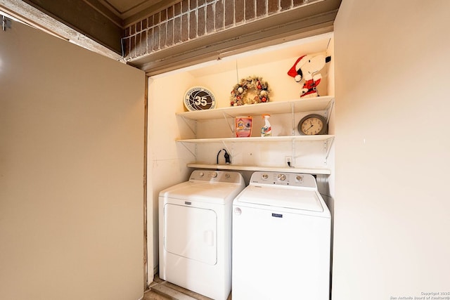 laundry room featuring washer and dryer and laundry area