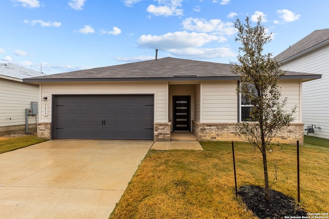 view of front of house with a garage, brick siding, a shingled roof, concrete driveway, and a front lawn