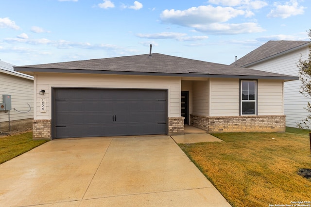 ranch-style home featuring a garage, brick siding, a shingled roof, concrete driveway, and a front lawn