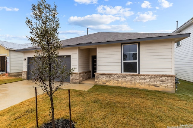 ranch-style house with a garage, a front yard, brick siding, and driveway