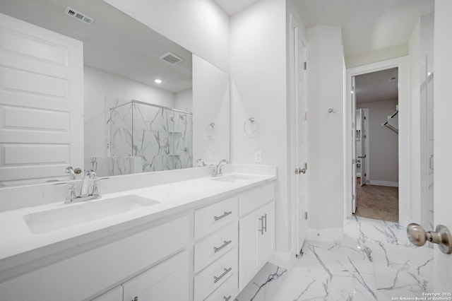 18414 Rhone Riv, San Antonio, TX 78256 - bathroom featuring a marble finish shower, marble finish flooring, double vanity, and a spacious closet