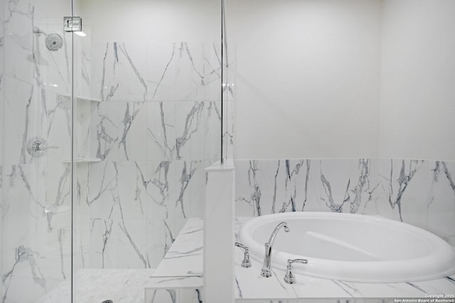18414 Rhone Riv, San Antonio, TX 78256 - bathroom with a bath and a marble finish shower