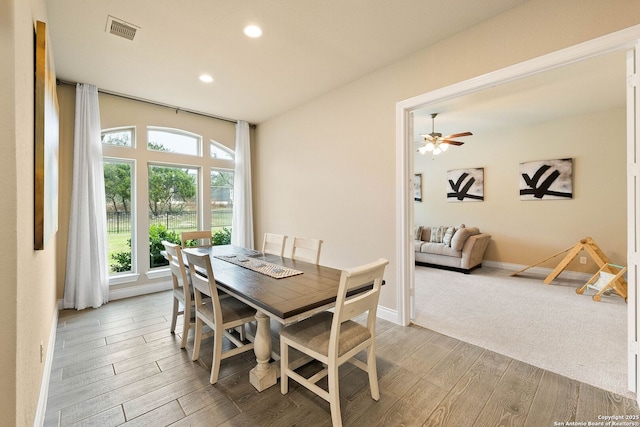 dining room featuring ceiling fan, recessed lighting, visible vents, baseboards, and light wood finished floors