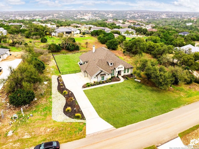 drone / aerial view with a residential view