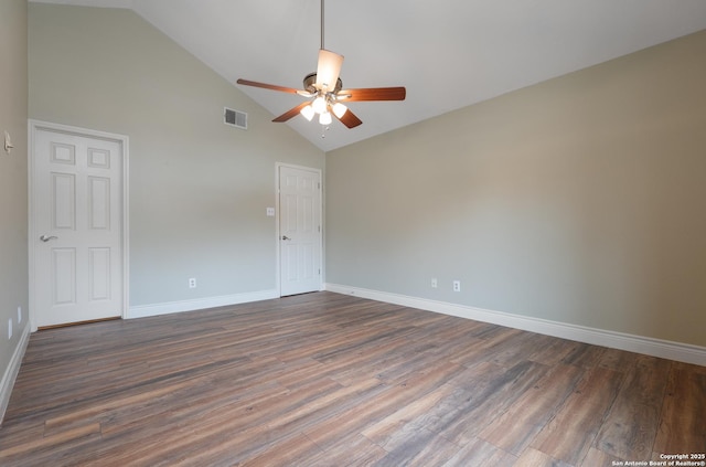 empty room with baseboards, ceiling fan, visible vents, and dark wood-type flooring