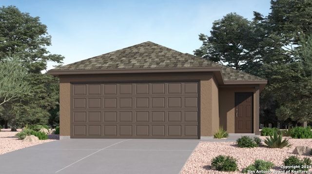 garage with concrete driveway