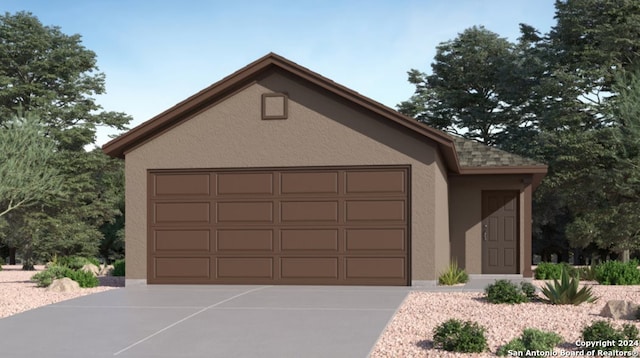 garage featuring driveway