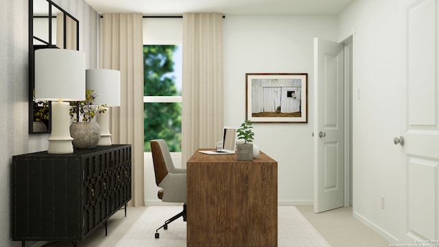 office featuring light carpet, a wealth of natural light, and baseboards