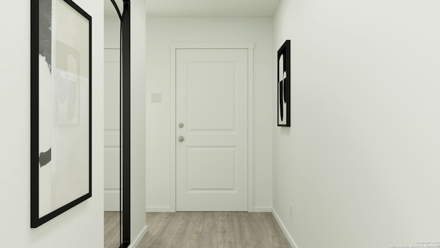 hall with baseboards and light wood finished floors