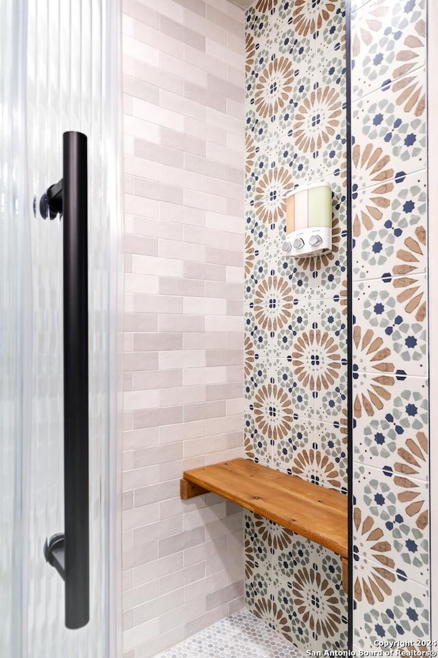 mudroom with tile walls