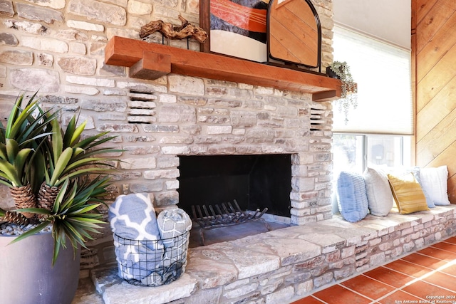 details with a stone fireplace