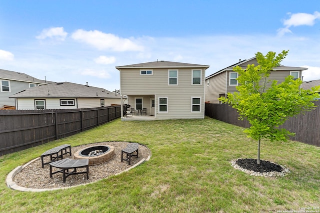 9818 Western Sedge, San Antonio, TX 78254 - rear view of house featuring a fenced backyard, a patio, a yard, and a fire pit