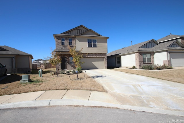 craftsman-style home featuring an attached garage, a residential view, board and batten siding, and concrete driveway