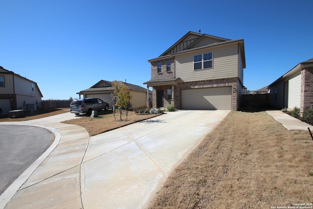 view of front facade with board and batten siding, a garage, concrete driveway, and brick siding