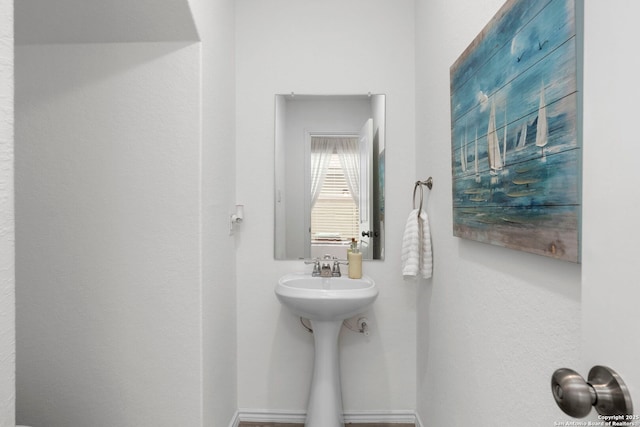 bathroom with baseboards