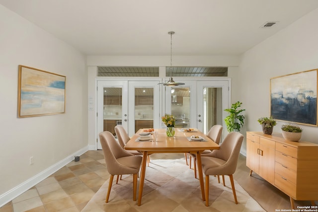 dining room with french doors, visible vents, and baseboards