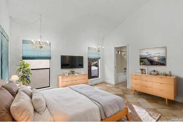 bedroom with a chandelier, high vaulted ceiling, light tile patterned floors, and connected bathroom